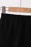 Black ruffle pants