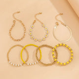 🌼7 Piece Gold Floral Bracelet Set